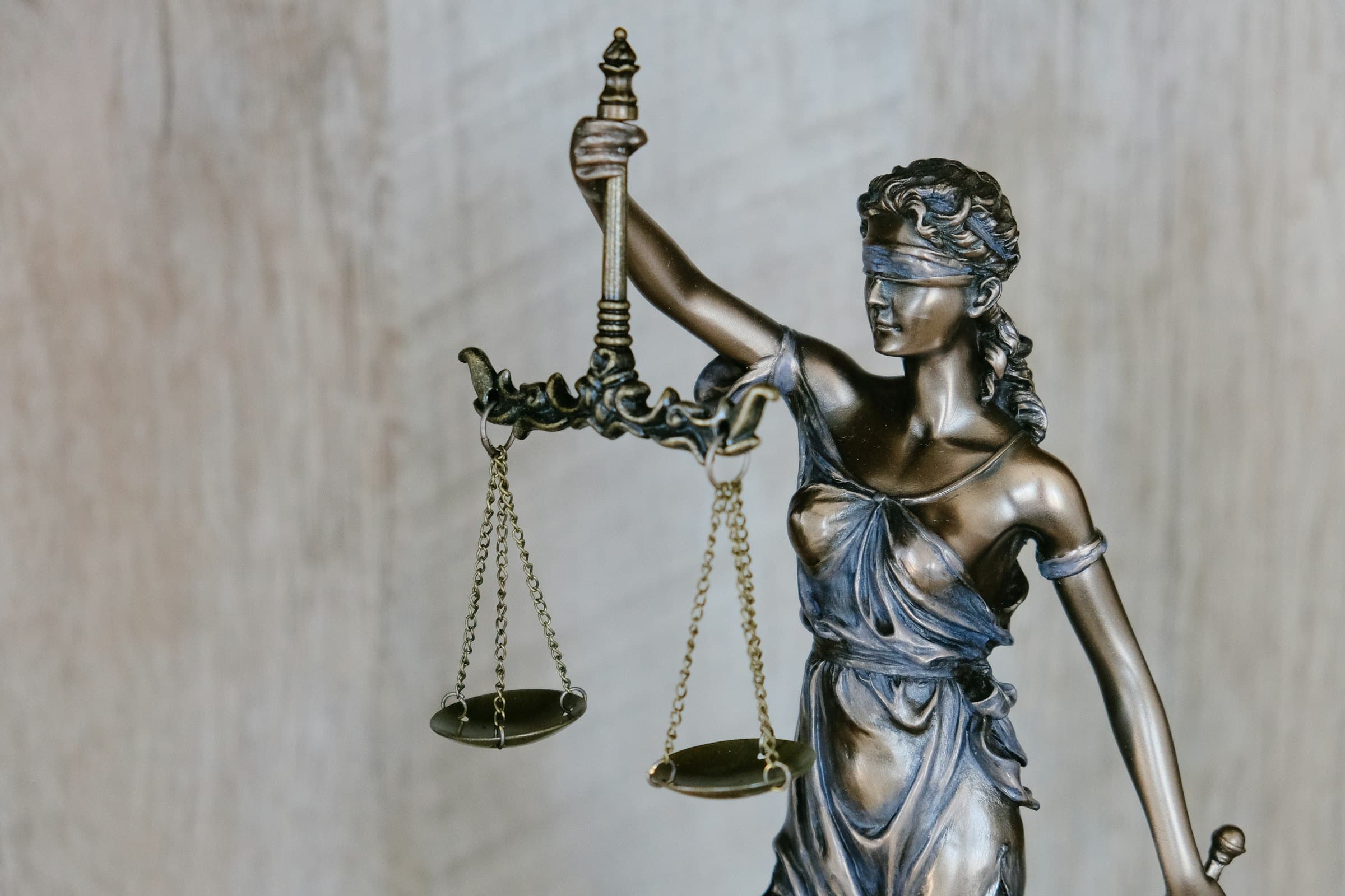 Statuette of Lady Justice holding scales